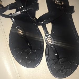 Coach sandals plastic look with gold accent. BN